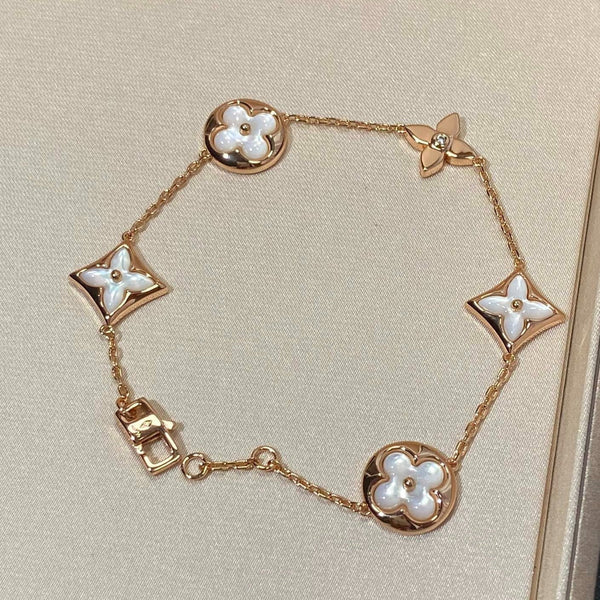 ˇShow YourselfˇSTAR AND SUN 5 MOTIF MOP PINK GOLD BRACELET